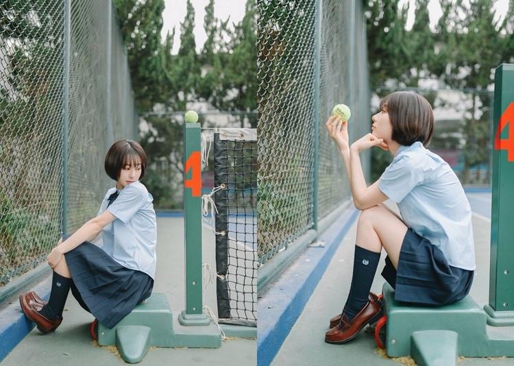 短發(fā)少女清純甜美戶外球場(chǎng)寫真圖片